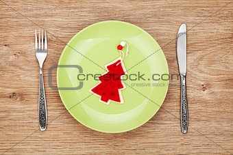 Christmas decor on plate and silverware