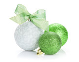 Christmas baubles and green ribbon
