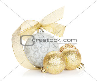 Christmas baubles and golden ribbon