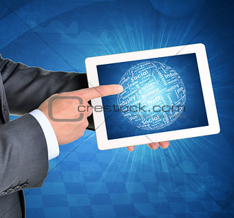 Man hands using tablet pc. Sphere of business words on touch screen