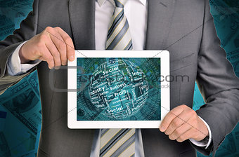 Man hands using tablet pc. Money and sphere of business words on touch screen