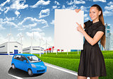 Businesswoman holding empty paper. Industrial zone, buildings and road with car 