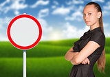Businesswoman and empty road sign