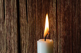 One burning candle