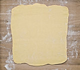 puff pastry dough on baking board
