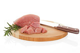Raw pork on chopping board.