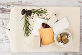 Cheese and olives. Luxurious appetizer. 
