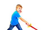 Young boy in studio playing with sword on white background
