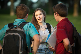 Cute Girl Talking with Boys