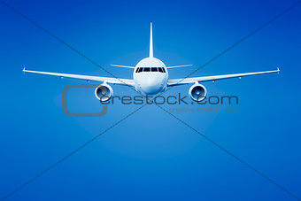 airplane in the bright blue sky
