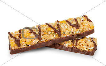bar with grains and nuts and chocolate on isolated white