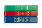 stack of vintage red, green and blue books on white isolation