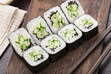 Sushi rolls with cucumber and sesame seed