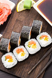 Sushi rolls with salmon and vegetables
