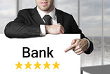 businessman pointing on sign bank