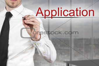 businessman writing application in the air