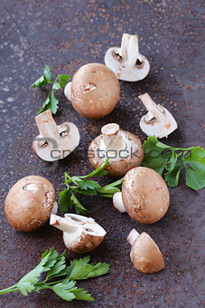 fresh organic mushrooms champignon with parsley leaves