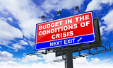 Budget in the Conditions of Crisis on Red Billboard.