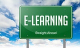 E-Learning on Highway Signpost.