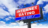 Internet Dating on Red Billboard.