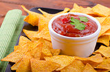 Tortilla chips with spicy tomato salsa