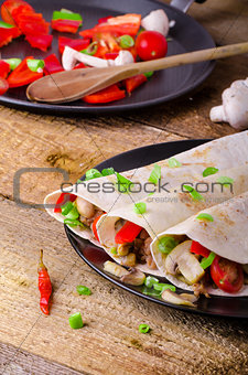 Chicken tortilla with mushrooms, garlic
