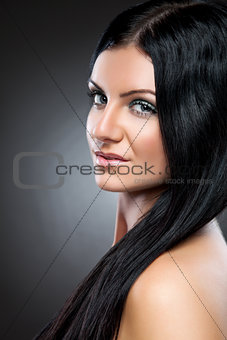Young beauty with long dark hair