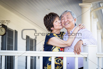 Attractive Chinese Couple Enjoying Their House