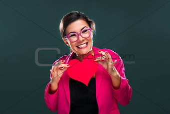 Funny woman holding a heart
