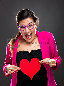 Funny woman holding a heart