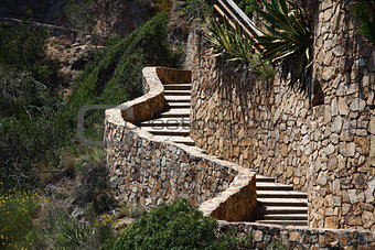 winding stone staircase in the mountains