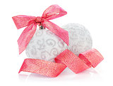 Christmas baubles and red ribbon