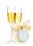 Two champagne glasses and christmas decor