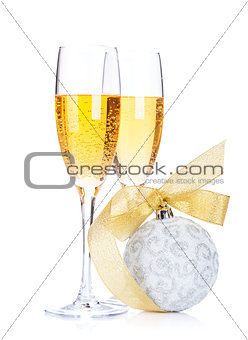 Two champagne glasses and christmas decor