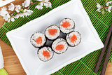 Sushi maki set and sakura branch