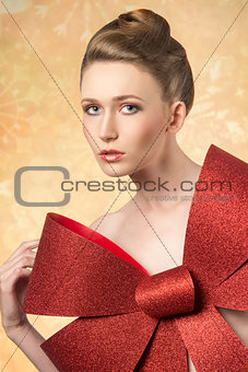 girl with big christmas bow 
