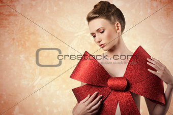 lovely girl with christmas bow 