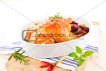 Delicious chicken with fresh herbs and vegetables.