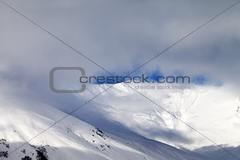 View on off-piste slope in mist