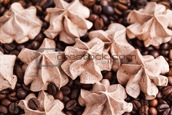 Chocolate meringues on coffee beans 