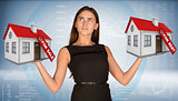 Businesswoman holding two house with tags for sale and rent