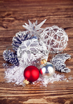 Christmas balls with tinsel and snow