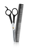 scissors and comb professional hairdresser with reflection