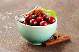 cherry compote with berries and spices anise, cinnamon