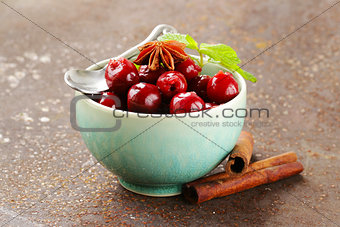 cherry compote with berries and spices anise, cinnamon