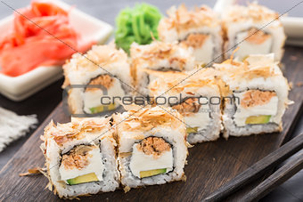 Sushi rolls with salmon teriyaki