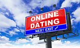 Online Dating  Inscription on Red Billboard.