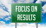 Focus on Results in Highway Signpost.