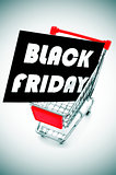 signboard with the text black friday in a shopping cart