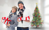 Composite image of festive mature couple holding christmas gifts